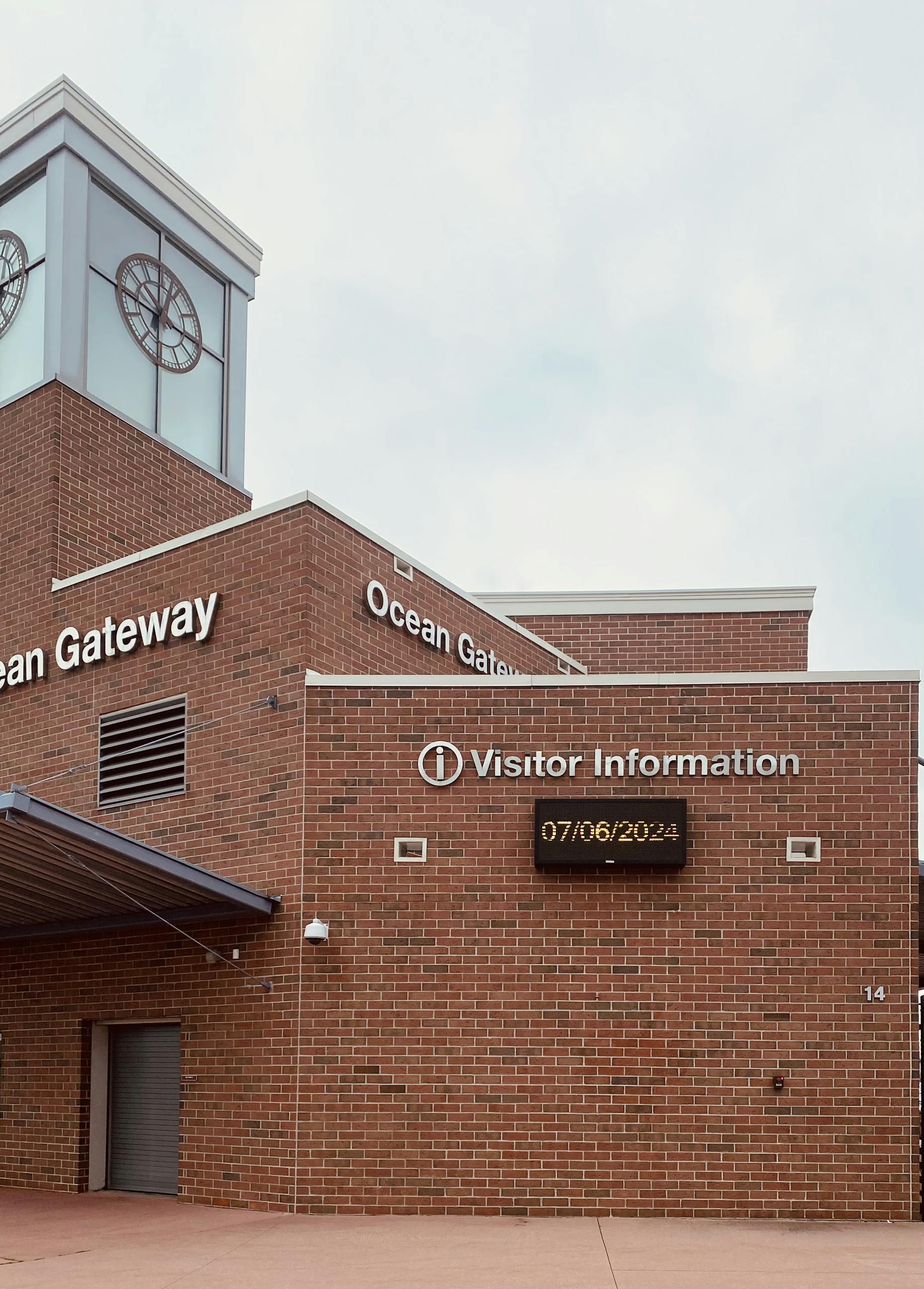 Brick facade of Ocean Gateway Visitor Center in Portland, ME captured on a cloudy day.